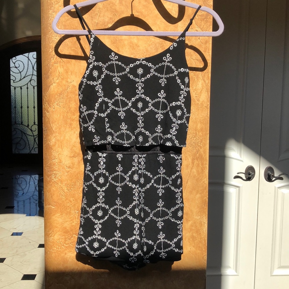 White designed black romper